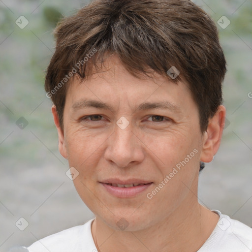 Joyful white adult male with short  brown hair and brown eyes