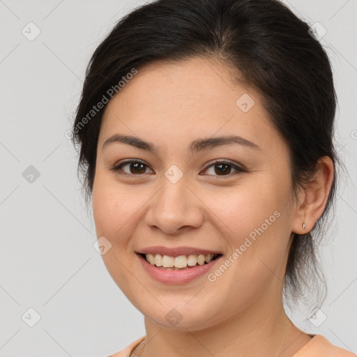 Joyful white young-adult female with medium  brown hair and brown eyes