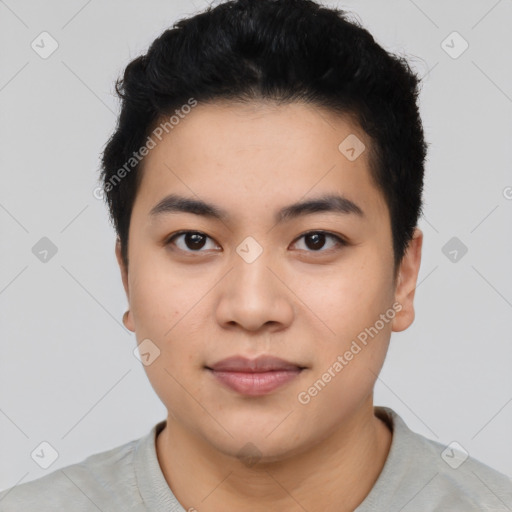 Joyful asian young-adult male with short  black hair and brown eyes