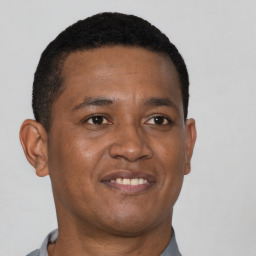 Neutral black young-adult male with short  brown hair and brown eyes