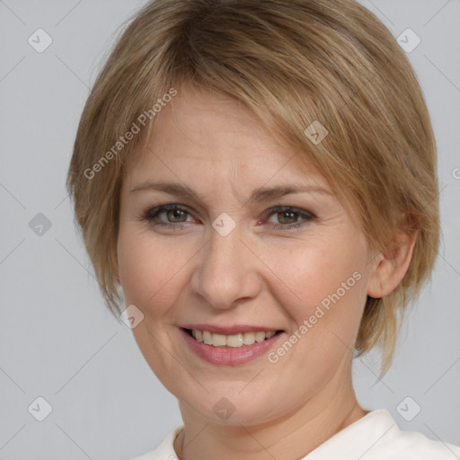 Joyful white young-adult female with medium  brown hair and blue eyes