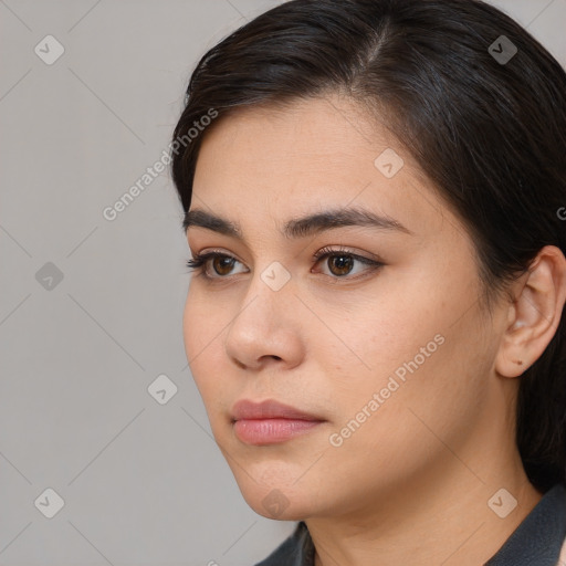 Neutral white young-adult female with medium  brown hair and brown eyes