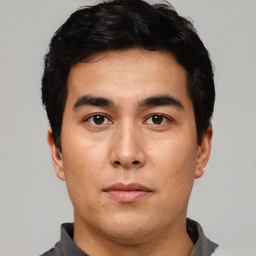 Neutral asian young-adult male with short  black hair and brown eyes