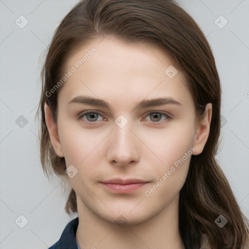 Neutral white young-adult female with long  brown hair and brown eyes