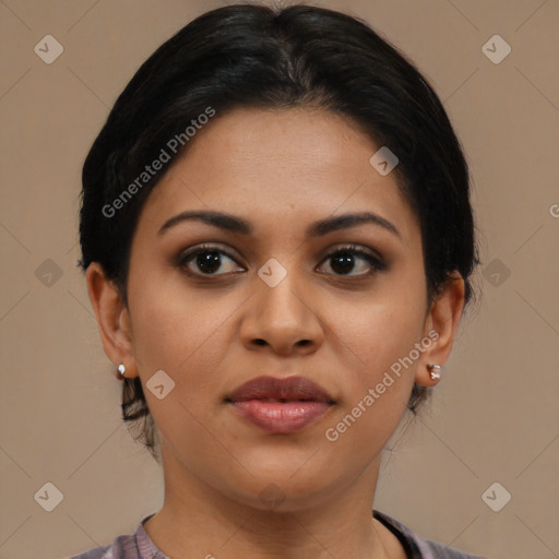 Joyful latino young-adult female with medium  brown hair and brown eyes