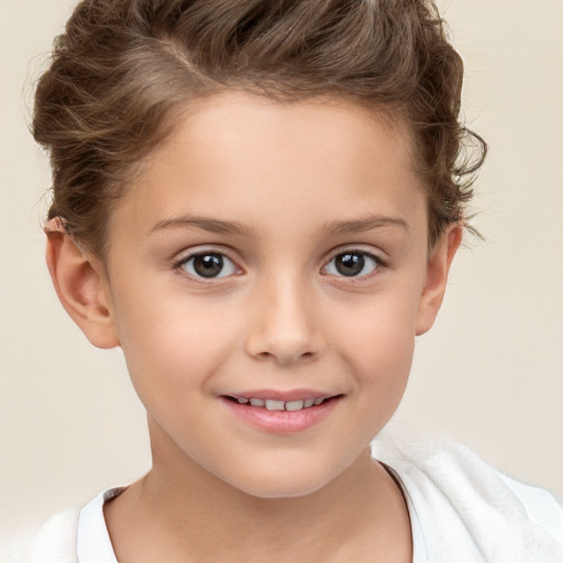 Joyful white child female with short  brown hair and brown eyes