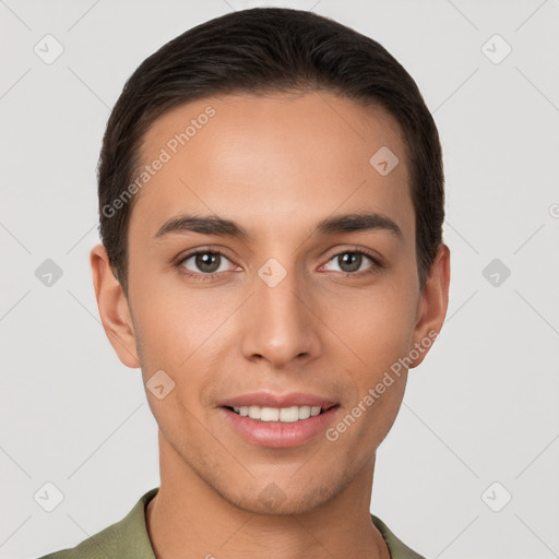 Joyful white young-adult male with short  brown hair and brown eyes