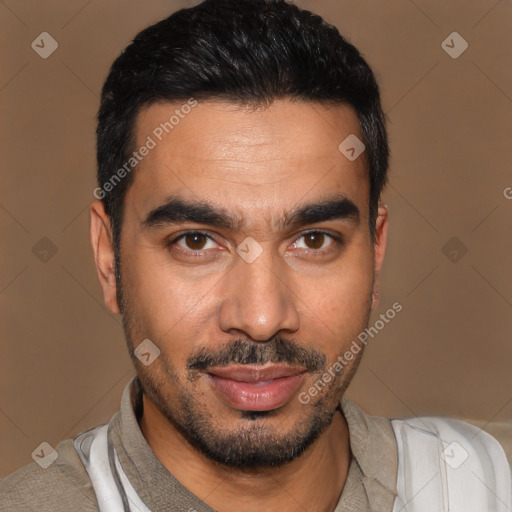 Joyful latino young-adult male with short  black hair and brown eyes