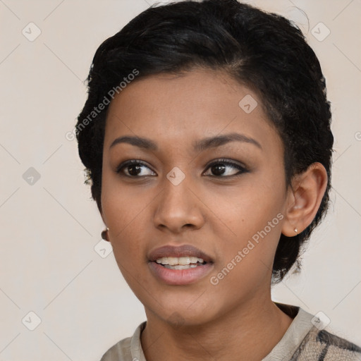 Joyful latino young-adult female with short  black hair and brown eyes