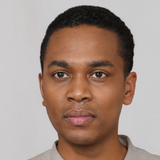 Neutral black young-adult male with short  black hair and brown eyes