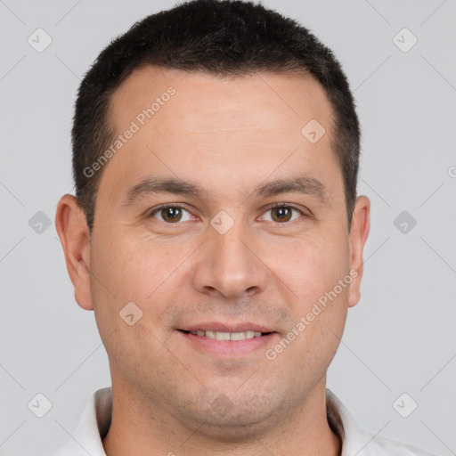 Joyful white young-adult male with short  brown hair and brown eyes