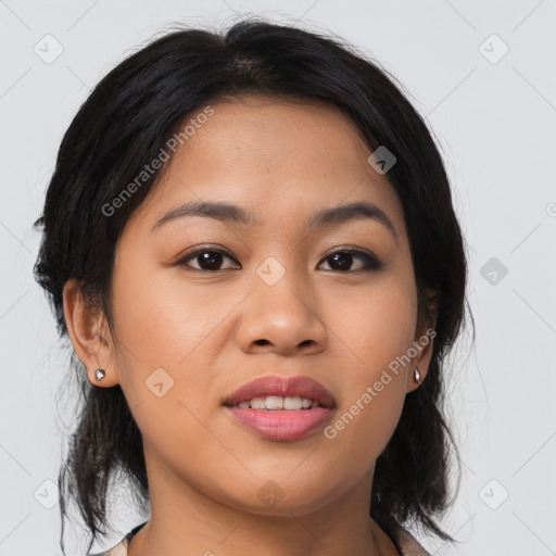 Joyful asian young-adult female with medium  brown hair and brown eyes