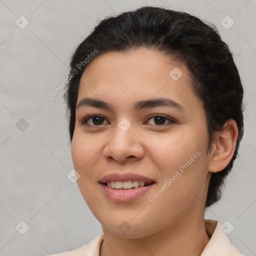 Joyful latino young-adult female with short  brown hair and brown eyes