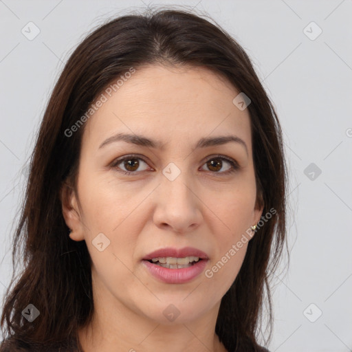 Joyful white young-adult female with long  brown hair and brown eyes