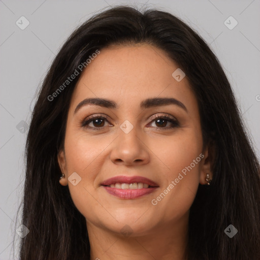 Joyful latino young-adult female with long  brown hair and brown eyes