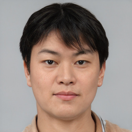 Neutral asian young-adult male with short  brown hair and brown eyes