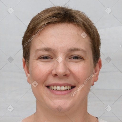 Joyful white adult female with short  brown hair and brown eyes