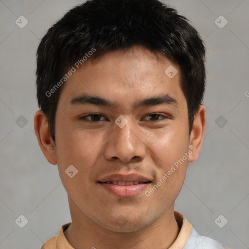 Joyful asian young-adult male with short  brown hair and brown eyes