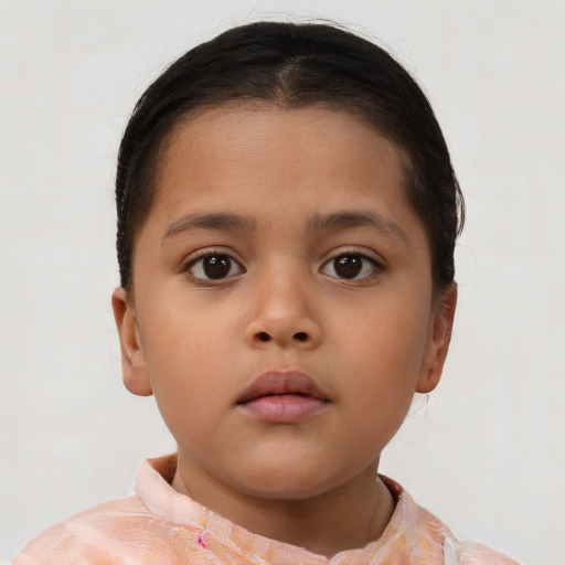 Neutral latino child female with short  brown hair and brown eyes