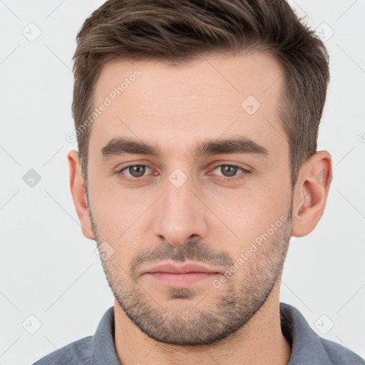 Neutral white young-adult male with short  brown hair and brown eyes