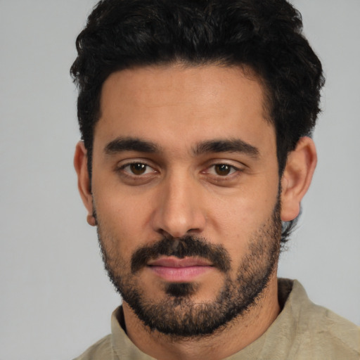 Neutral latino young-adult male with short  black hair and brown eyes