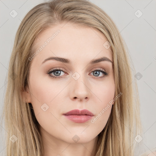 Neutral white young-adult female with long  brown hair and brown eyes