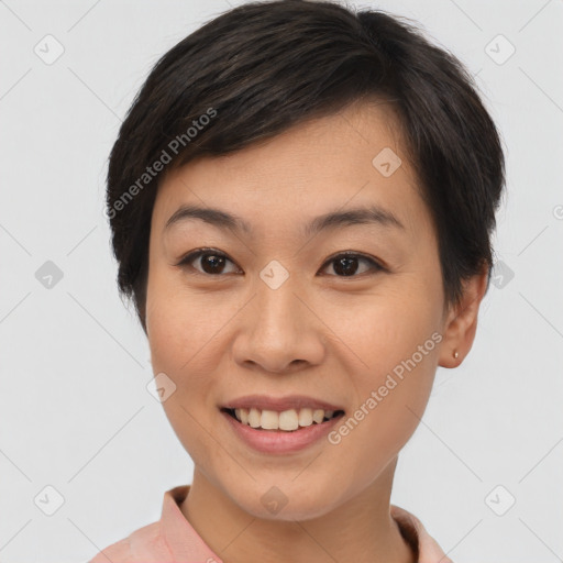 Joyful asian young-adult female with short  brown hair and brown eyes