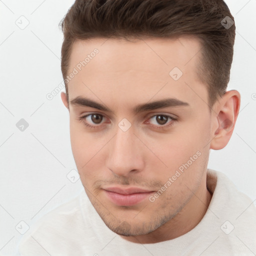 Neutral white young-adult male with short  brown hair and brown eyes