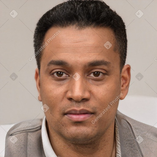 Neutral latino young-adult male with short  black hair and brown eyes