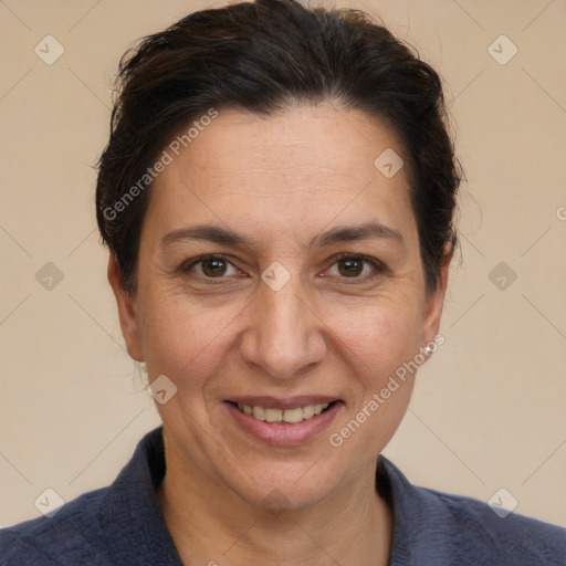 Joyful white adult female with short  brown hair and brown eyes