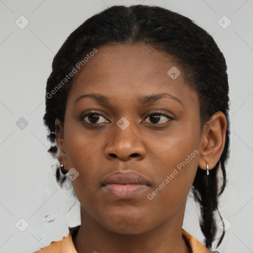 Neutral black young-adult female with short  brown hair and brown eyes