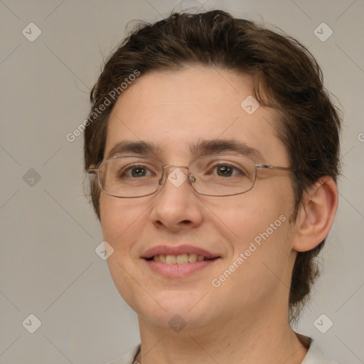 Joyful white adult female with medium  brown hair and brown eyes