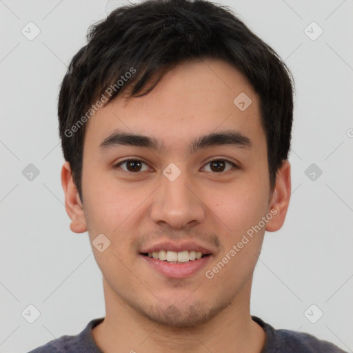 Joyful white young-adult male with short  black hair and brown eyes