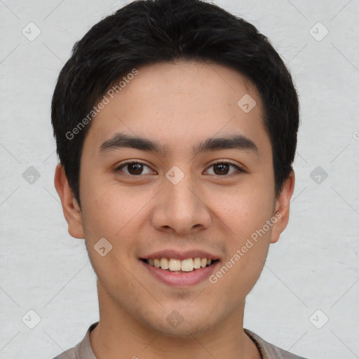 Joyful asian young-adult male with short  black hair and brown eyes