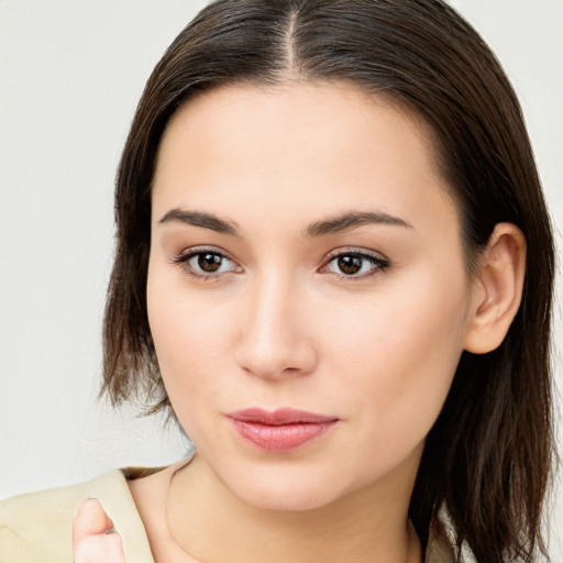 Neutral white young-adult female with medium  brown hair and brown eyes