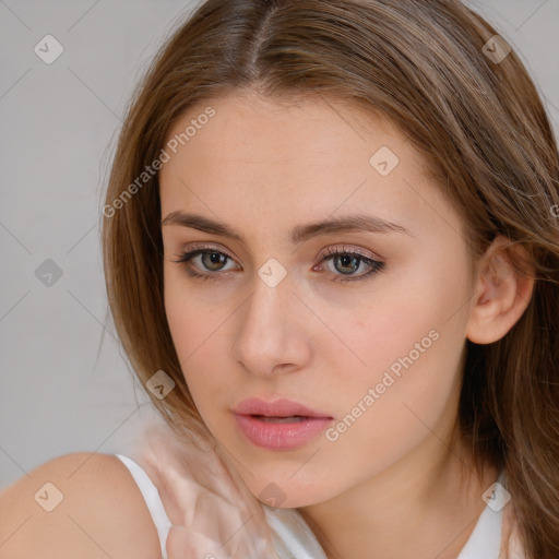 Neutral white young-adult female with medium  brown hair and brown eyes