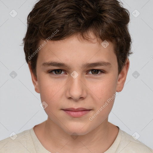 Joyful white child male with short  brown hair and brown eyes