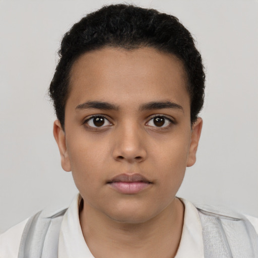 Neutral latino child male with short  brown hair and brown eyes