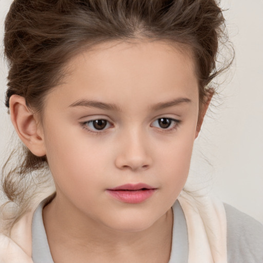 Neutral white child female with medium  brown hair and brown eyes