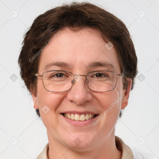 Joyful white adult female with short  brown hair and grey eyes