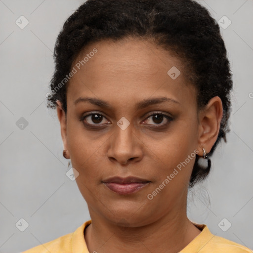 Neutral black young-adult female with short  brown hair and brown eyes