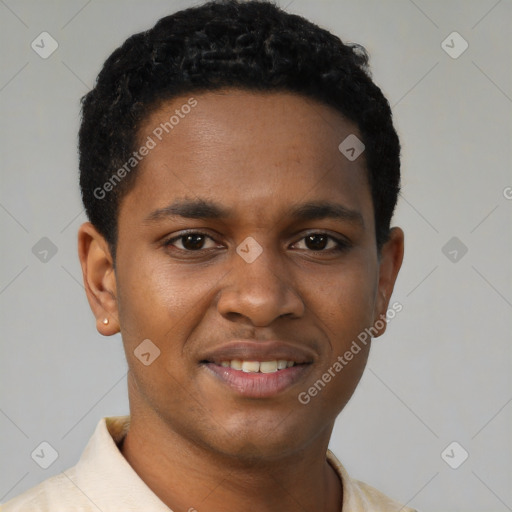 Joyful black young-adult male with short  brown hair and brown eyes