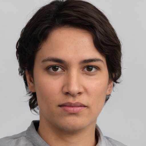Neutral white young-adult male with medium  brown hair and brown eyes