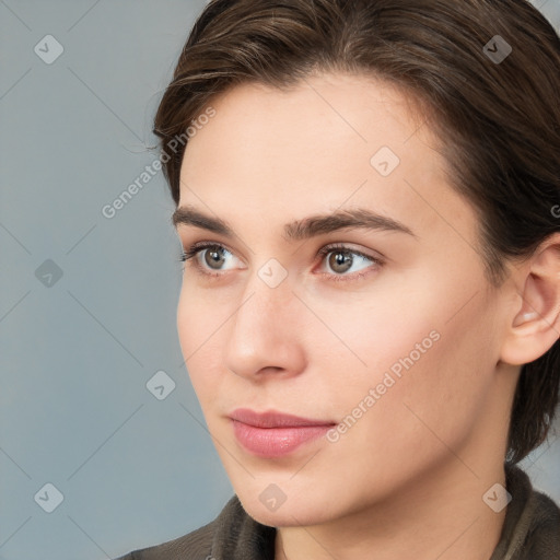 Neutral white young-adult female with medium  brown hair and brown eyes