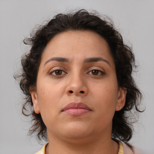 Neutral asian young-adult female with medium  brown hair and brown eyes