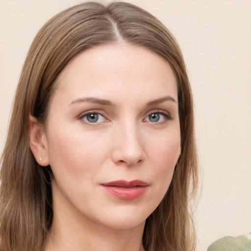 Neutral white young-adult female with long  brown hair and grey eyes