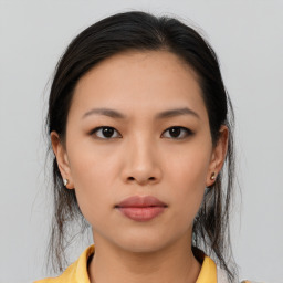 Neutral asian young-adult female with medium  brown hair and brown eyes