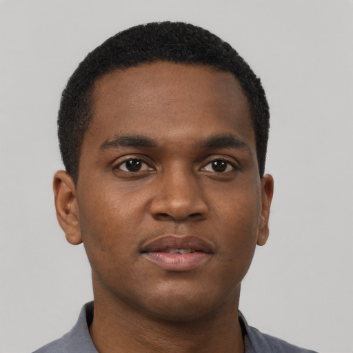 Neutral black young-adult male with short  black hair and brown eyes