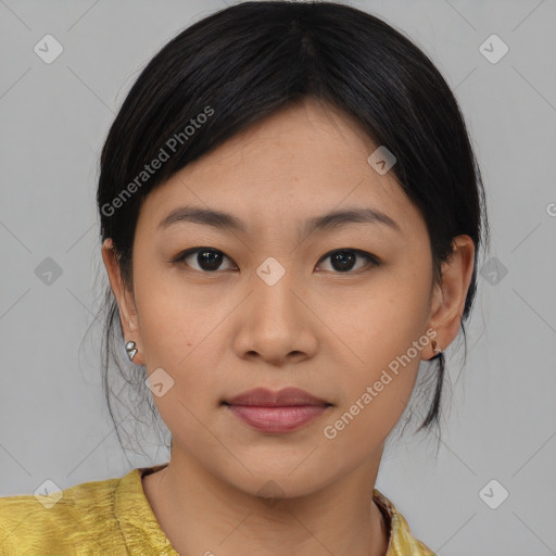 Joyful asian young-adult female with medium  brown hair and brown eyes