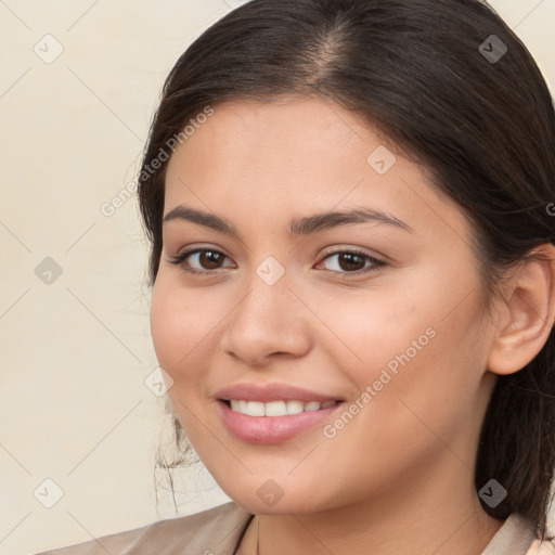 Joyful white young-adult female with medium  brown hair and brown eyes